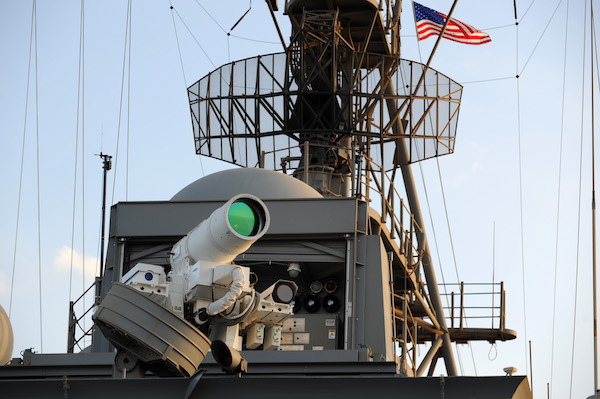 141115-N-PO203-057 ARABIAN GULF (Nov. 15, 2014) The Afloat Forward Staging Base (Interim) USS Ponce (ASB(I) 15) conducts an operational demonstration of the Office of Naval Research (ONR)-sponsored Laser Weapon System (LaWS) while deployed to the Arabian Gulf. (U.S. Navy photo by John F. Williams/Released)