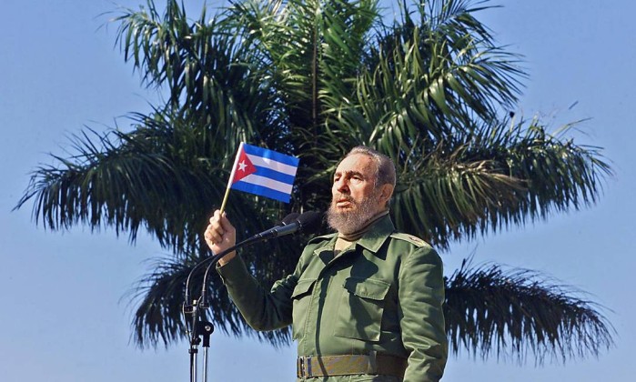 62934531_files-this-file-photo-taken-on-january-26-2001-shows-cuban-president-fidel-castro-wavin